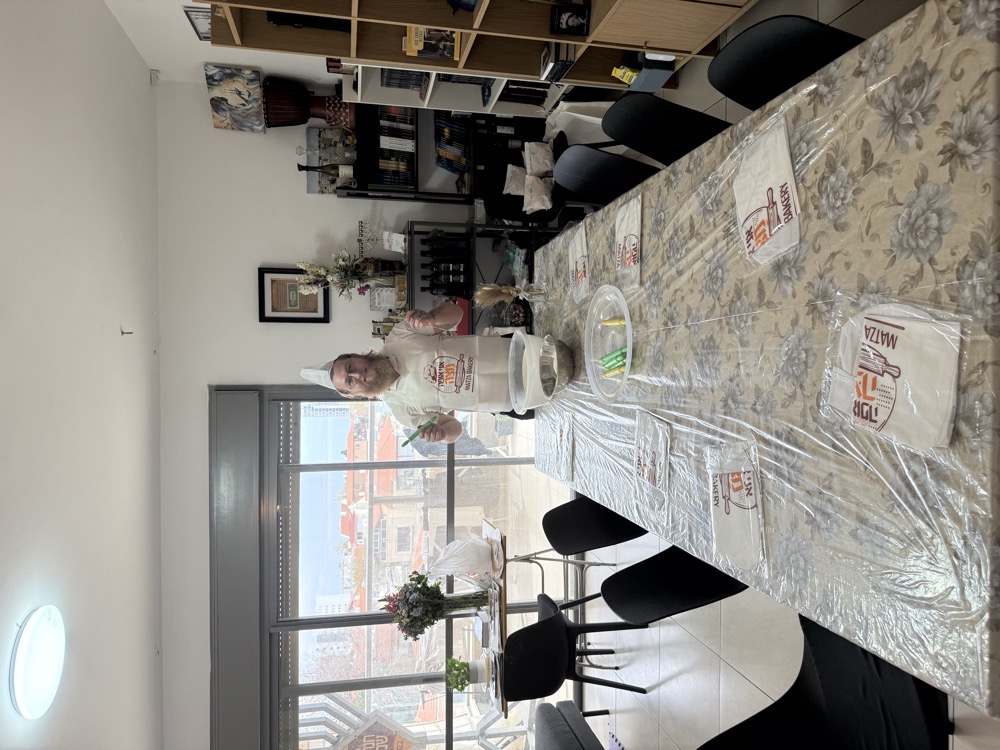 A long table being prepared for guests at home